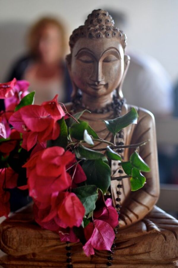 Yoga El Palmar mit Buddha und Blumen