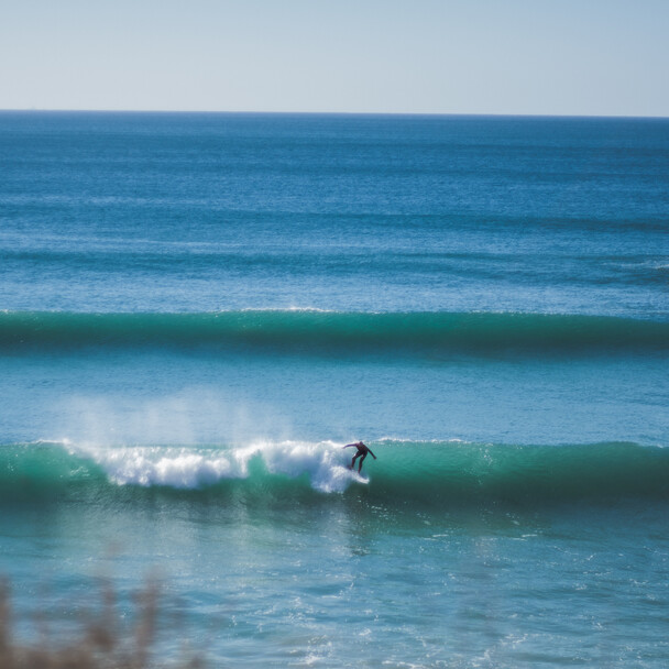 Surfer in a wave in Conil