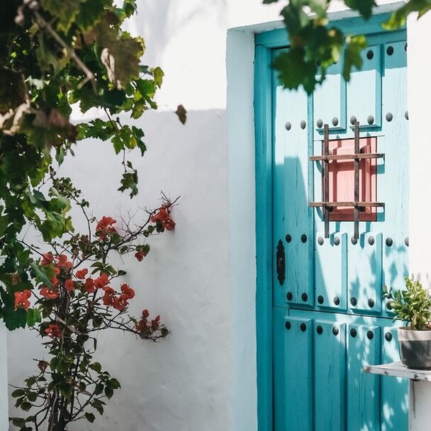 Blue door from the accommodation in the surf camp Spain