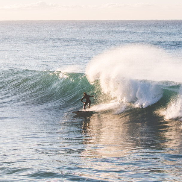 Surfing in Andalusia in December, surfers on waves