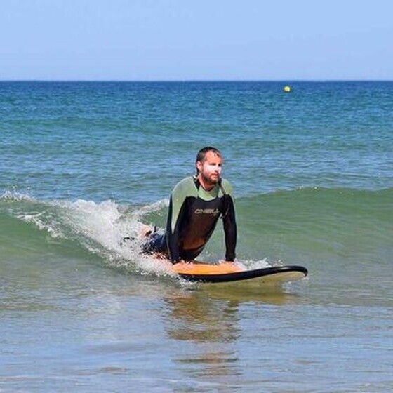 Gleitstütz beim Surfen lernen