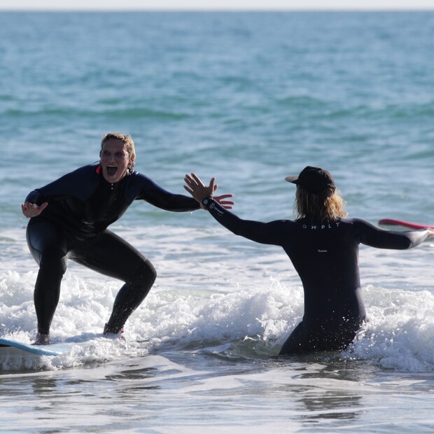 Learning to stand up while surfing