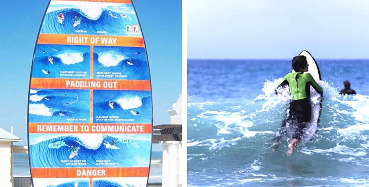 Surfer in Welle, Schild mit Surf Regeln