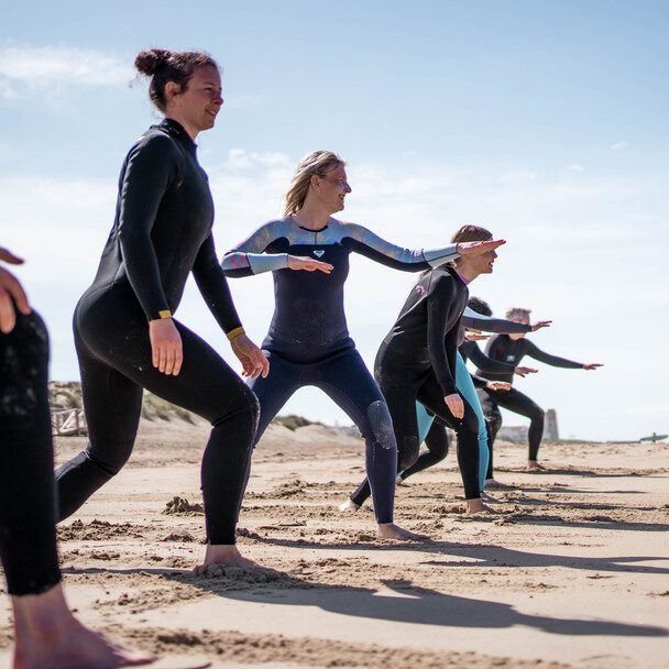 Surf fitness exercises on the beach