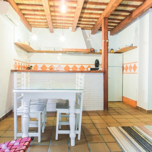 Casa Neuva accommodation El Palmar, table and chairs, kitchen