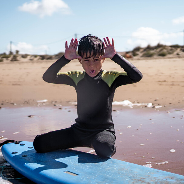 Child on a family surf course