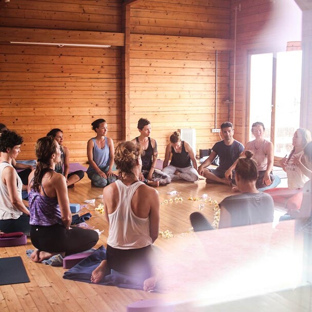 Yoga class with flowers