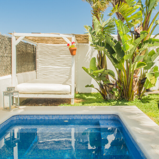 Pool and day bed at surf camp Andalusia