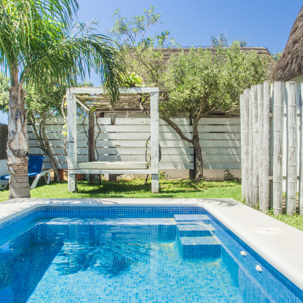 Pool and outdoor shower at surf camp Andalusia