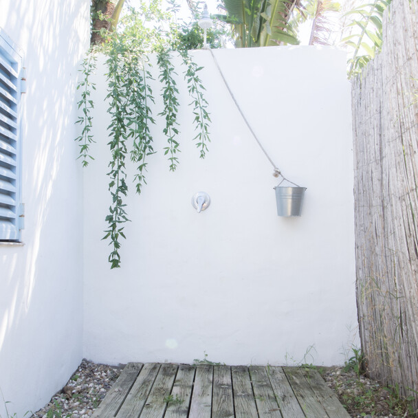 Outdoor shower at Oasis Surfcamp Andalusia