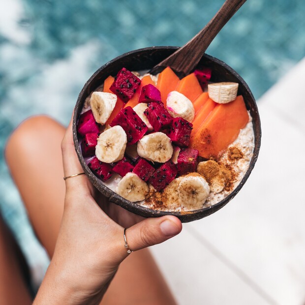 Healthy bowl with bananas, melon etc., catering at the A-Frame surf camp