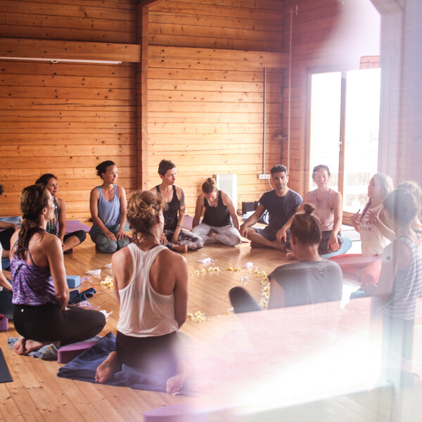 Yoga class on your yoga vacation by the sea