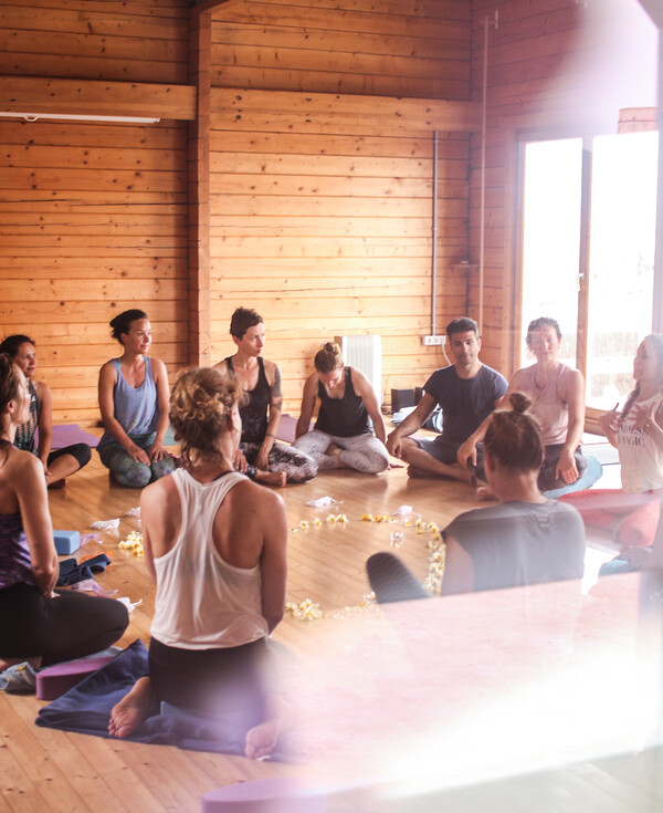 Yoga class on your yoga vacation by the sea