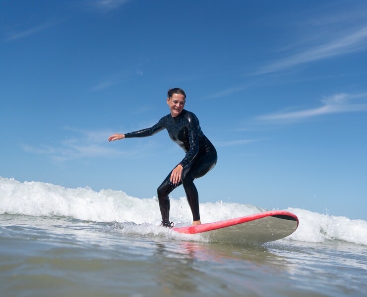 Surfing women surf camp, woman in the line-up