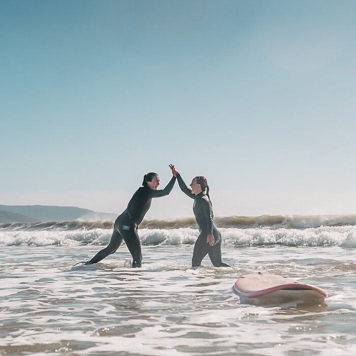 Women surfing in El Palmar